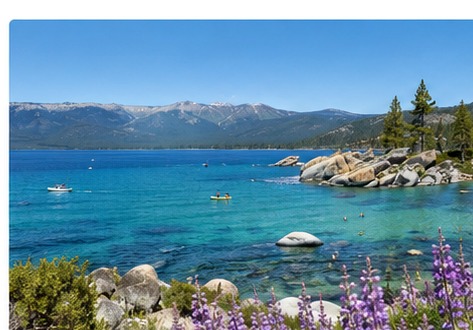 Bright blue Lake Tahoe water and mountain scenery in summer